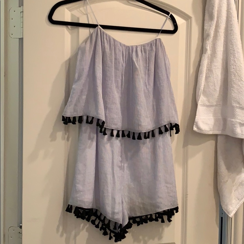 Light blue romper with navy tassels